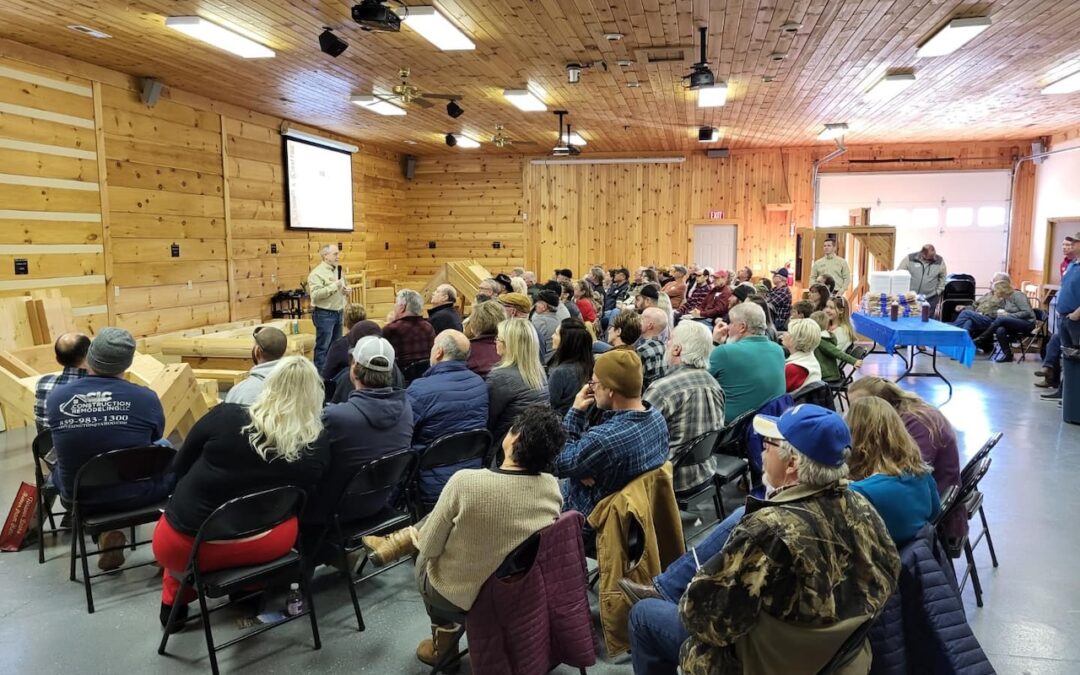 photo of people at the log raising workshop at the mill at Moss, TN, at Honest Abe Log Homes